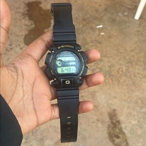 G-Shock Black and Gold Digital Watch